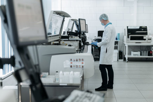 Scientist operating advanced laboratory test equipment